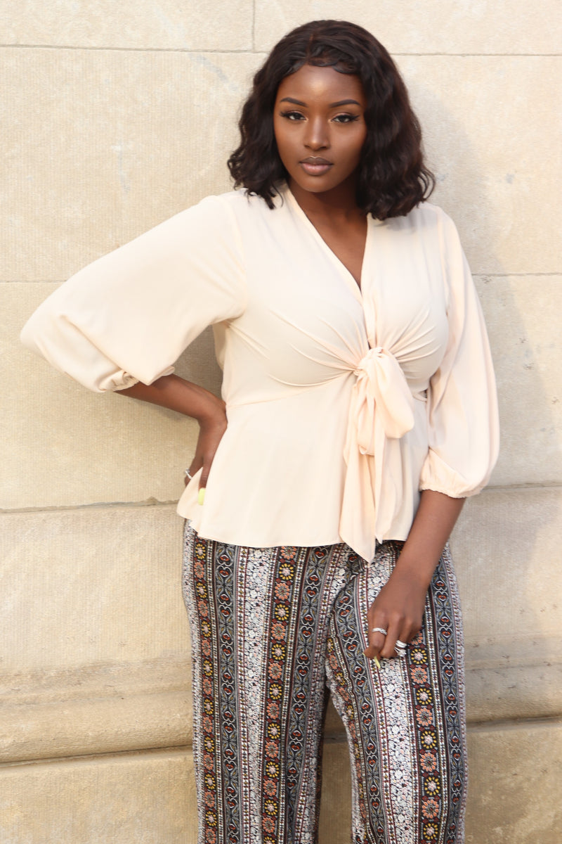 cream peplum top