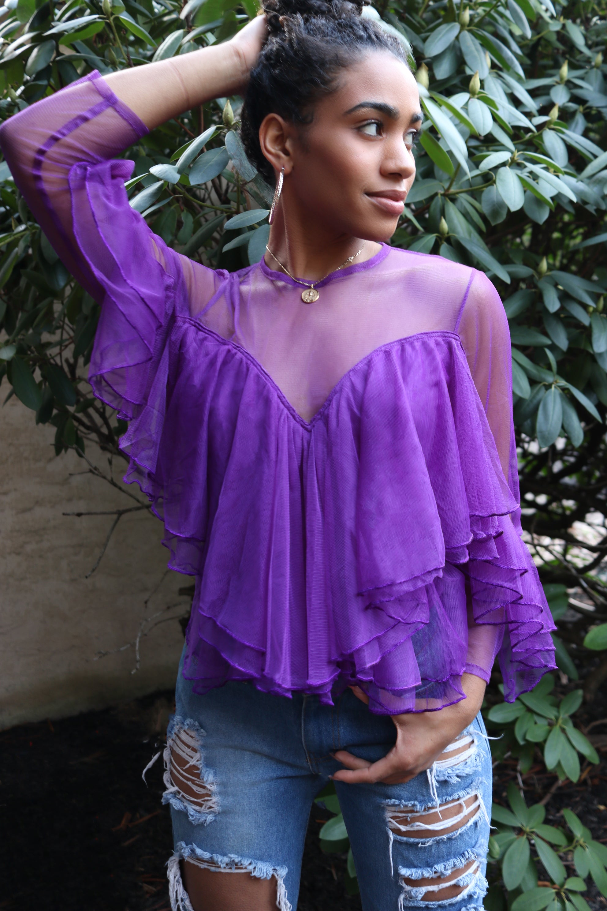 purple ruffle shirt